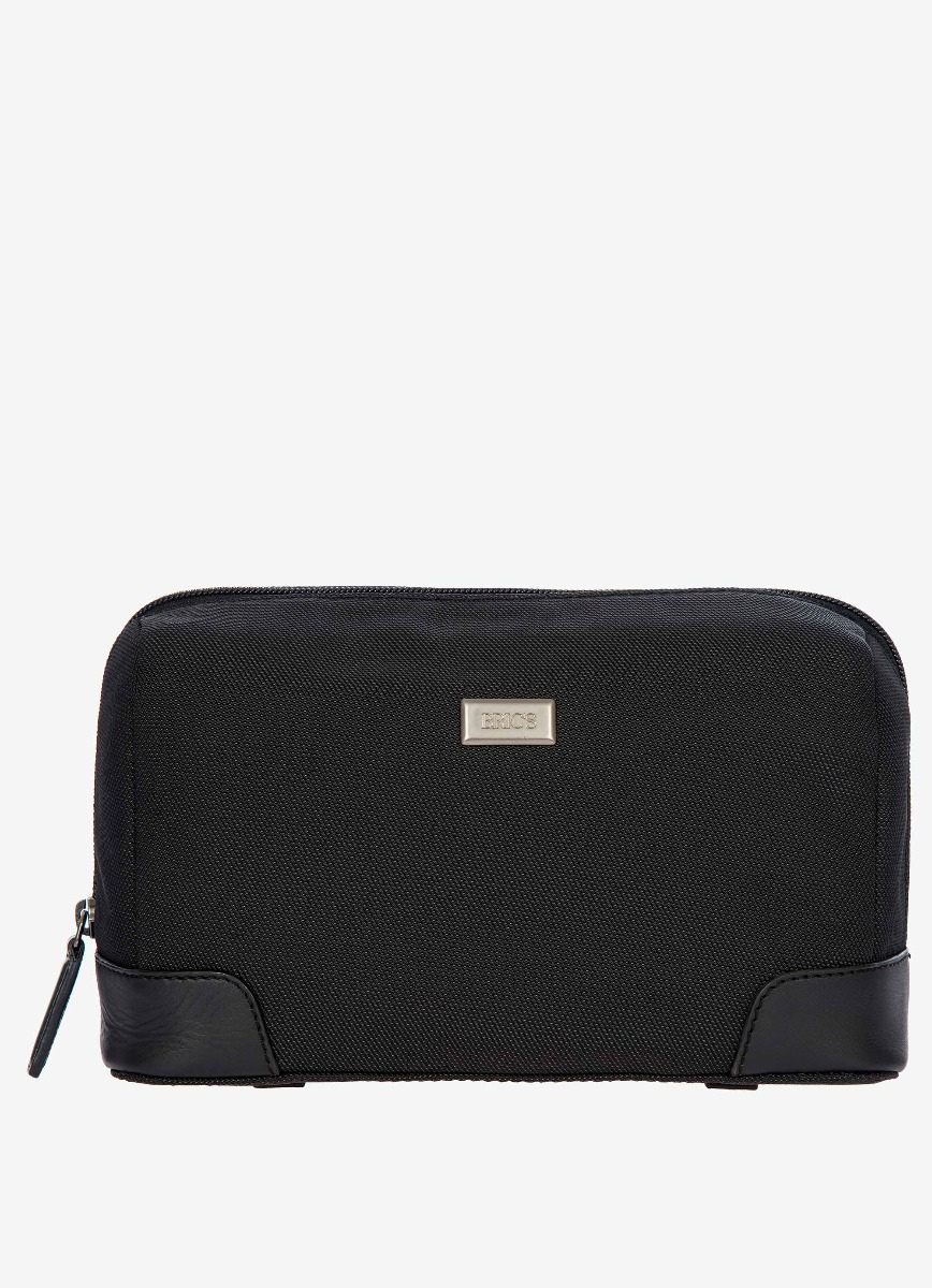 Nécessaire de voyage en cuir et nylon, collection Monza. - Bric's