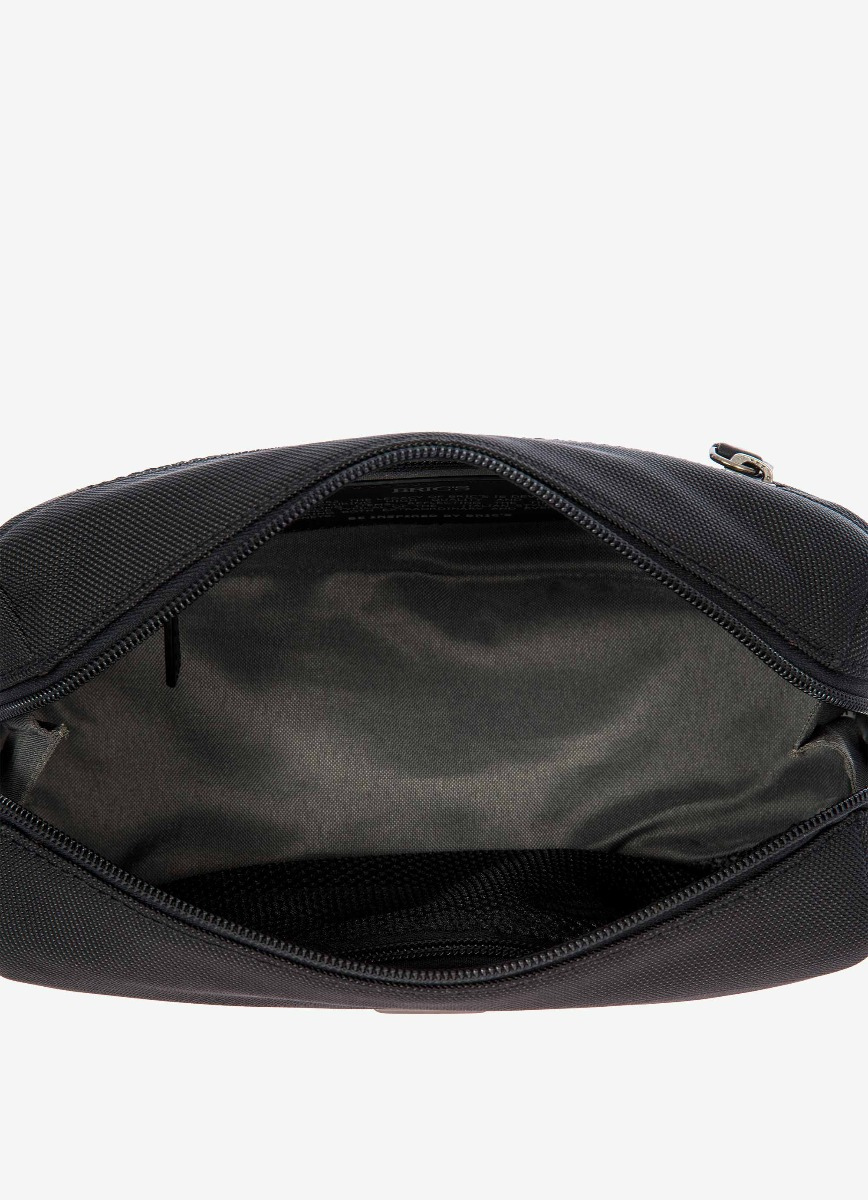Nécessaire de voyage en cuir et nylon, collection Monza. - Bric's